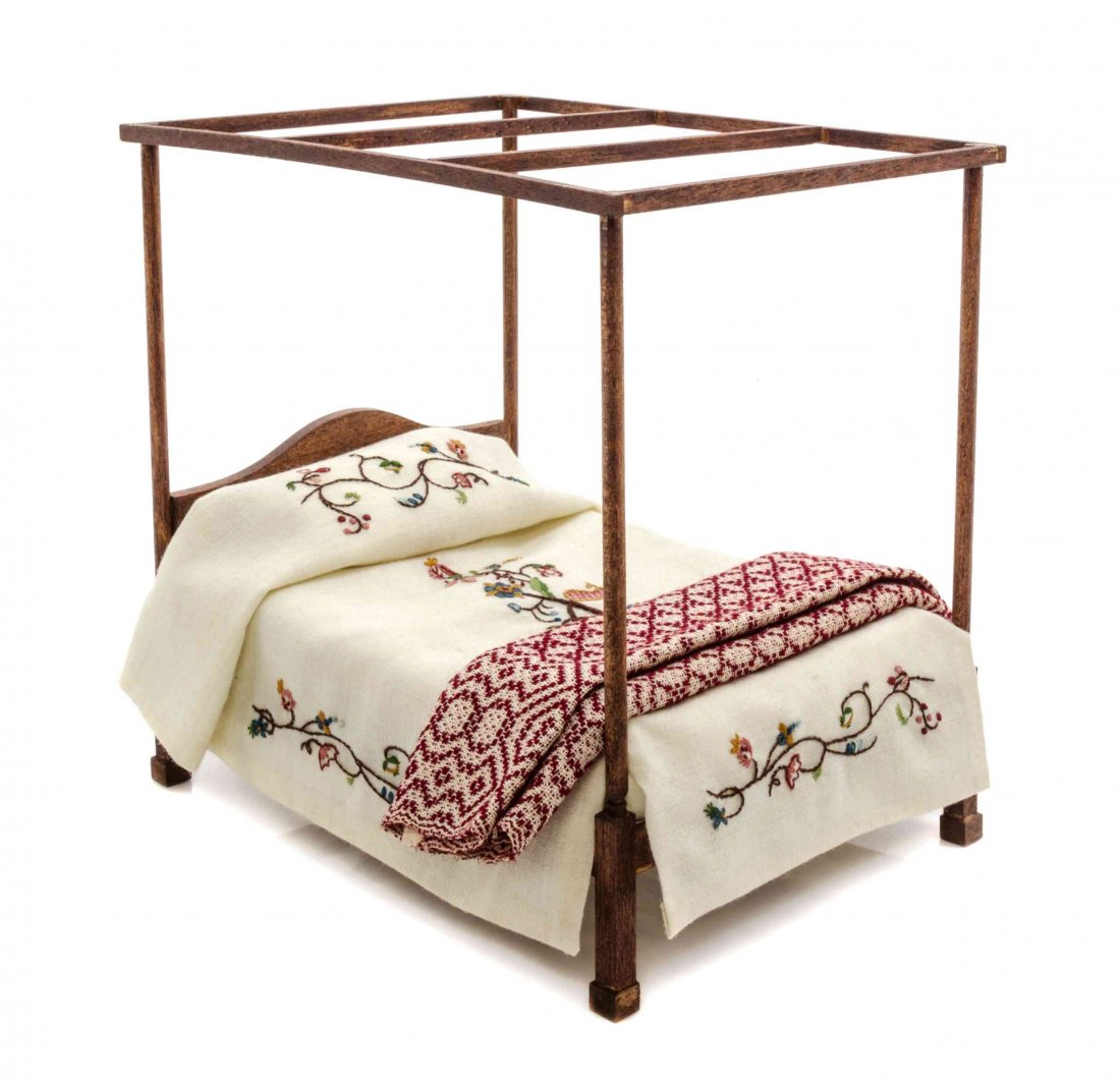 A Four Poster Bed, Height 7 x width 5 1/4 x depth 7: A Four Poster Bed, BEDCLOTHES BY COOKIE ZIEMBA, the coverlet worked in crewel embroidery, the bed with columnar supports ending in square legs. Height 7 x width 5 1/4 x depth 7 inches. Property from t