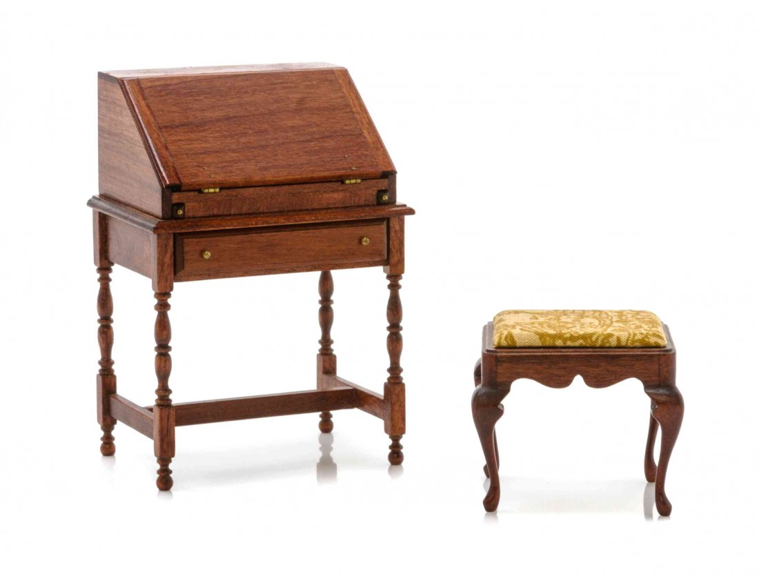 An American Style Slant Front Bureau, Height of bureau: An American Style Slant Front Bureau, R.L. GUTHEIL, the drop down writing surface opening to a fitted interior above a single drawer, raised on turned legs joined by stretchers, together with a footst