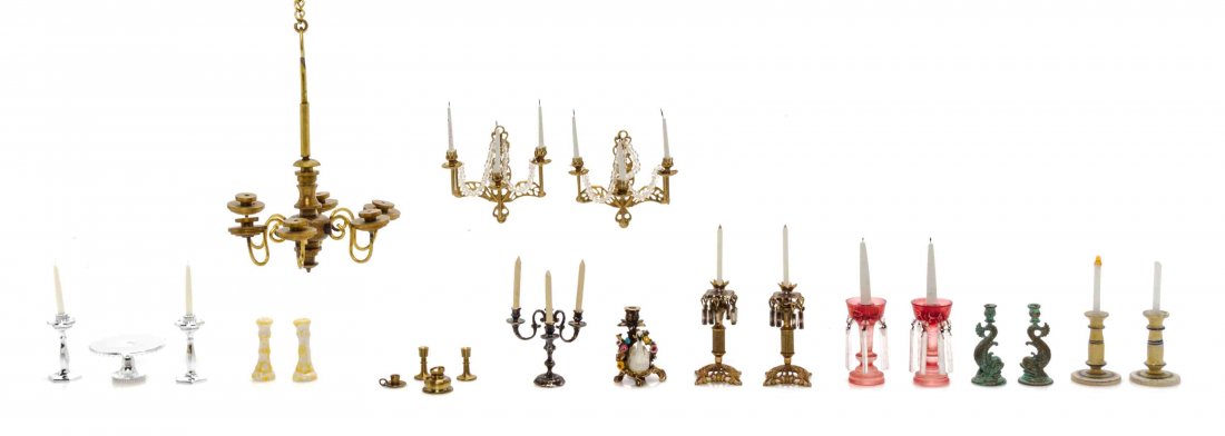 A Collection of Lighting Implements, Height of: A Collection of Lighting Implements, comprising candlesticks, a pair of sconces, a candelabrum and a six-light chandelier, 21 items total. Height of chandelier 3 1/4 inches. Property from the Estate o