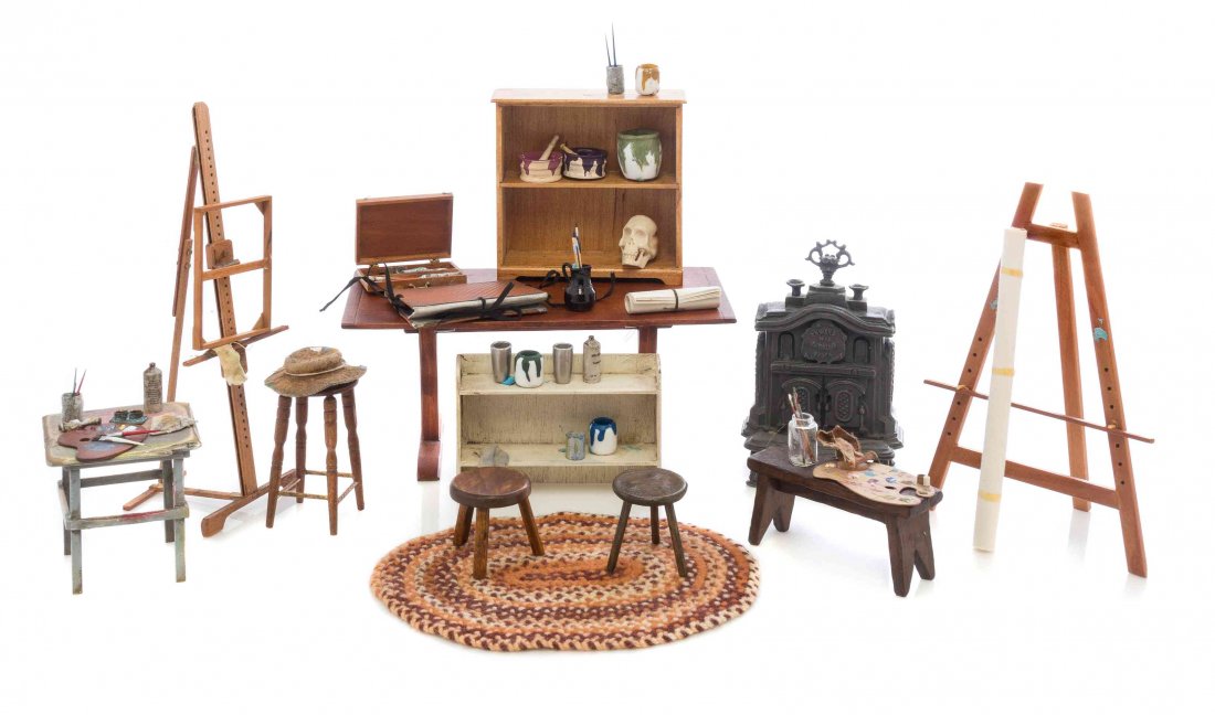 A Collection of Articles for a Painter's Studio, Height: A Collection of Articles for a Painter's Studio, comprising a rug, a trestle table, three stools, two easels, a bookcase by Tom Wolfort, a hat, two smocks and a sweater, a bench with a palette and pai