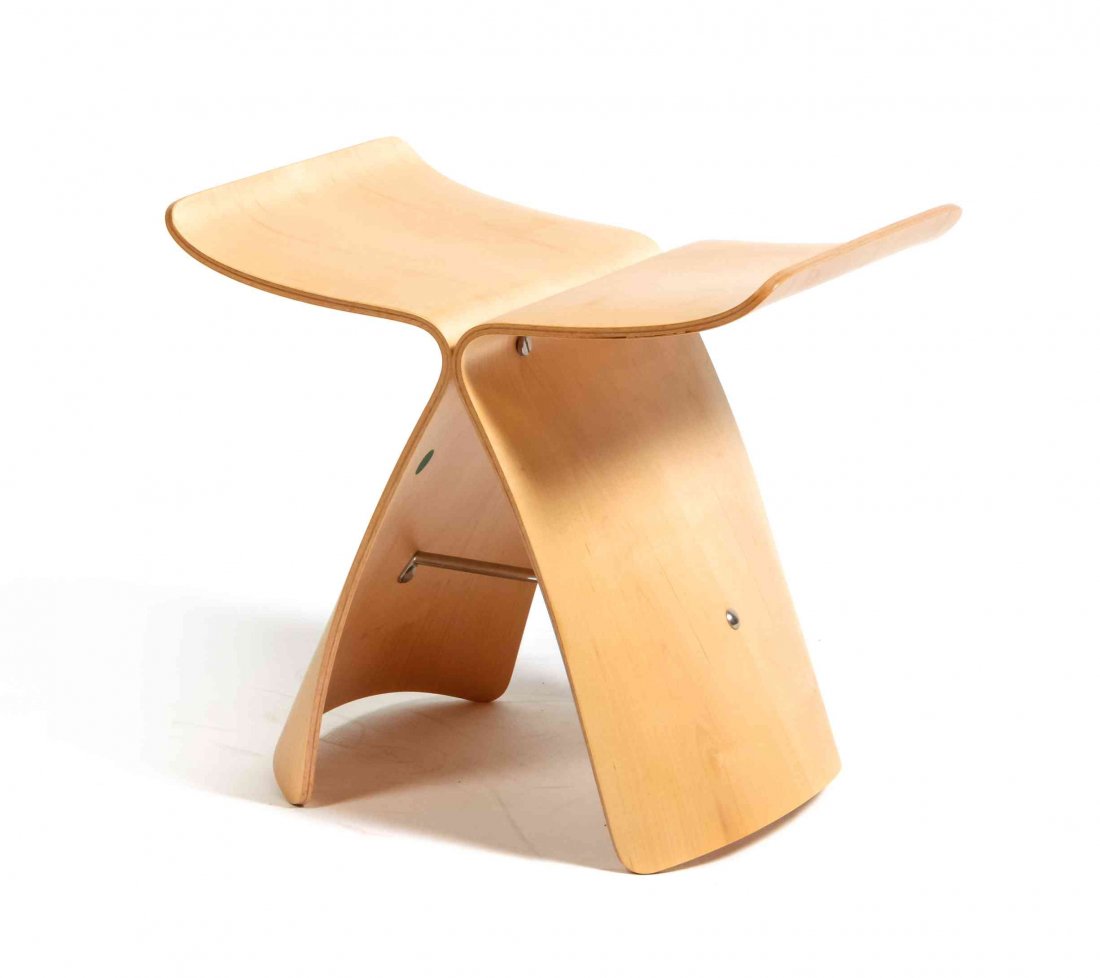 A Sori Yanagi Birch Butterfly Stool, Height 15 1/2 x: A Sori Yanagi Birch Butterfly Stool, having a shaped rectangular top, raised on twin supports joined by a chromed stretcher, signed Sori Yanagi. Height 15 1/2 x width 16 1/2 x depth 12 inches.