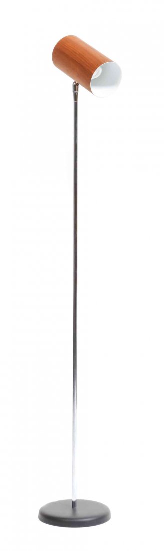 A George Nelson Walnut Holzzylinder Floor Lamp, Height: A George Nelson Walnut Holzzylinder Floor Lamp, the shade of cylindrical form, over a chromed standard, raised on a circular foot. Height 53 inches