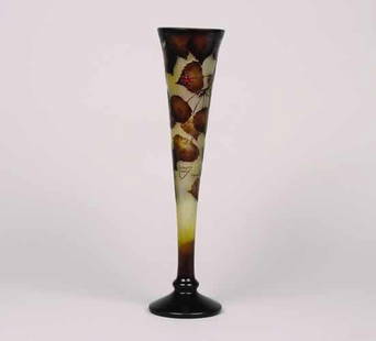 A Daum Cameo Glass Vase,: A Daum Cameo Glass Vase, decorated with leaves and applied insects, signed"Daum Nancy France" with the Croix de Lorraine.Height 19 3/4 inches.