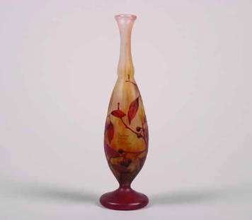 A Daum Cameo Glass Vase,: A Daum Cameo Glass Vase, the slender form decorated with branches and berries,signed "Daum Nancy France".Height 11 3/4 inches.