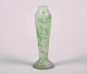 A Daum Cameo Glass Vase,: A Daum Cameo Glass Vase, decorated with intertwining thistles, signed on thebase ""Daum Nancy"" with the Croix de Lorraine.Height 10 inches.