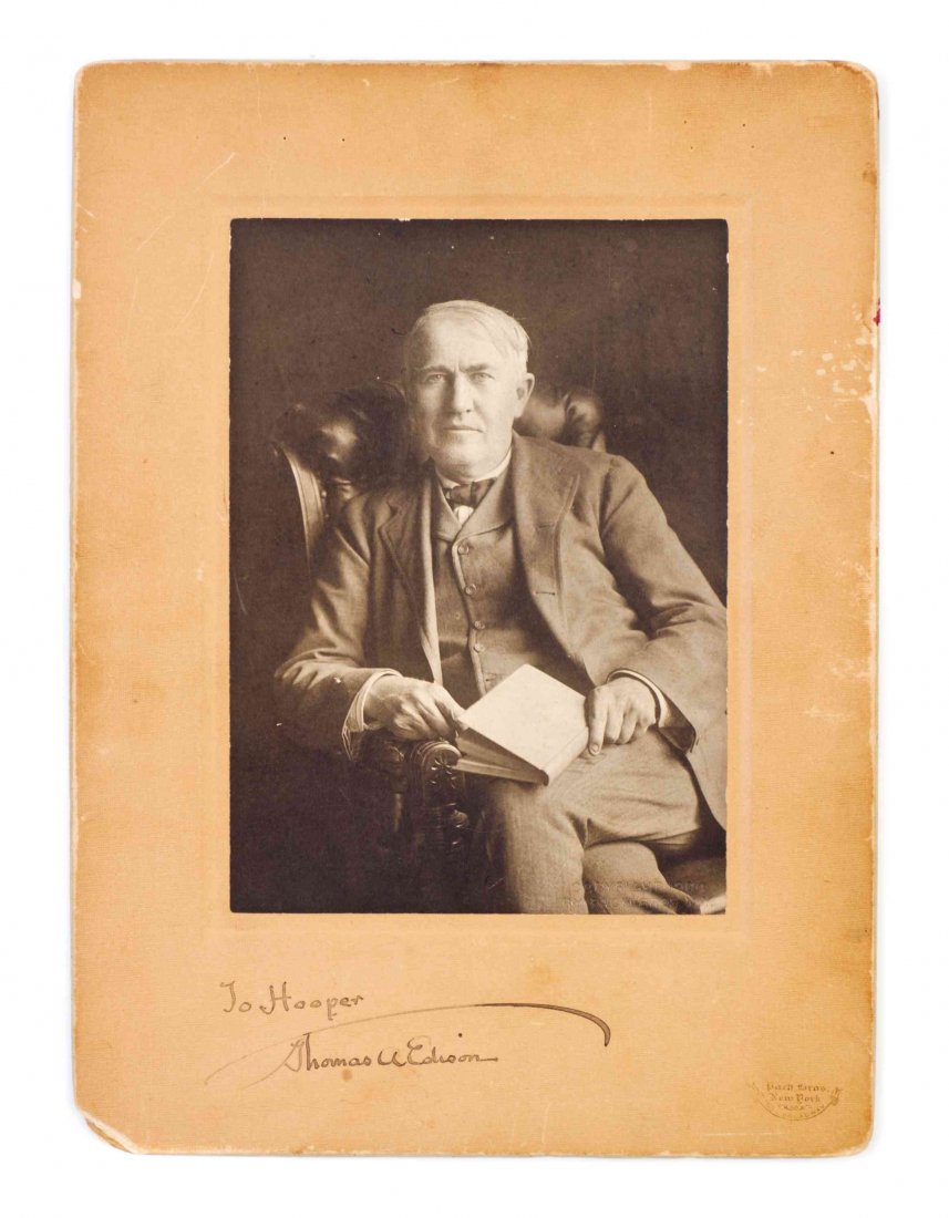 EDISON, THOMAS. Original black and white portrait: EDISON, THOMAS Original black and white portrait photograph signed and inscribed ("To Hooper / Thomas A. Edison"), on original photographer's mount (Pach Bros., New York), with copyright stamp to lowe