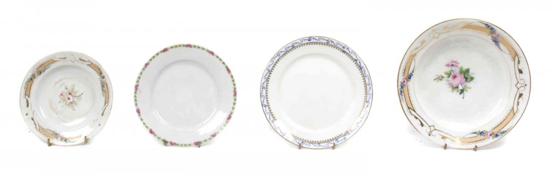 A Collection of Porcelain Dinnerware, Diameter of first: A Collection of Porcelain Dinnerware, comprising 9 French bowls with 5 matching saucers, together with 6 American plates, 6 German plates, and 12 Old Syracuse plates; 38 items total. Diameter of first