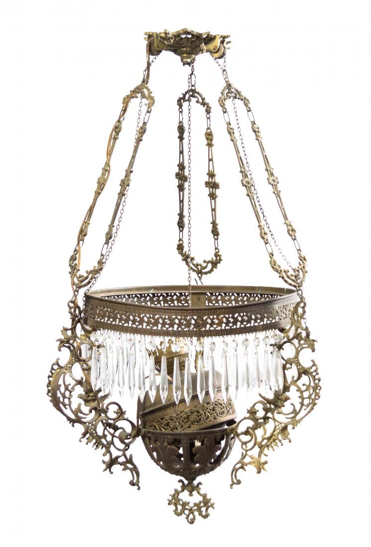 A Brass and Glass Hanging Fixture, Height 33 inches.: A Brass and Glass Hanging Fixture, 20TH CENTURY, hung with prisms, having a single lighting element. Height 33 inches. Property from the Estate of a Prominent Midwest Collector