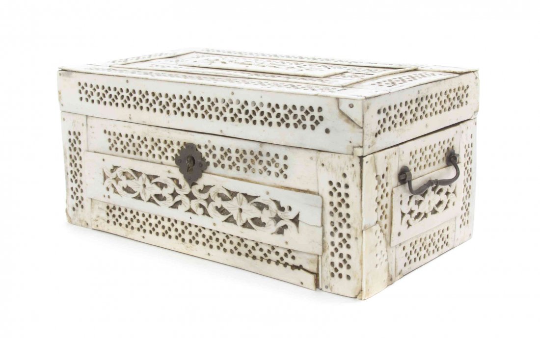 A Bone Veneer Table Casket, Height 3 3/4 x width 8 1/2: A Bone Veneer Table Casket, 19TH CENTURY, of rectangular form with bail handles. Height 3 3/4 x width 8 1/2 x depth 4 3/4 inches. Property of a Lady, St. Augustine, Florida
