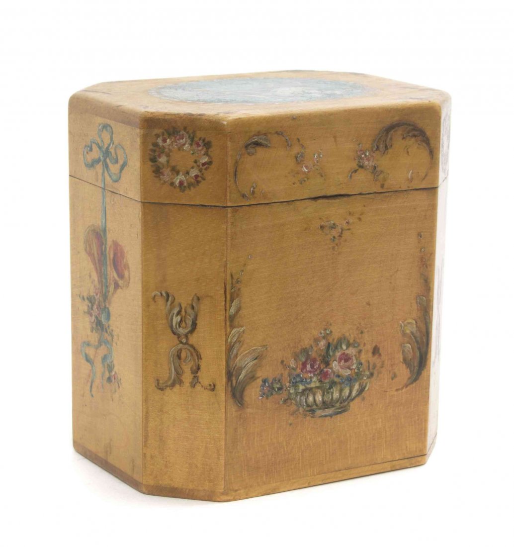 An Edwardian Style Painted Tea Caddy, Height 5 x width: An Edwardian Style Painted Tea Caddy, worked to show musical trophies throughout. Height 5 x width 4 3/4 x depth 3 1/2 inches. Property of a Lady, St. Augustine, Florida