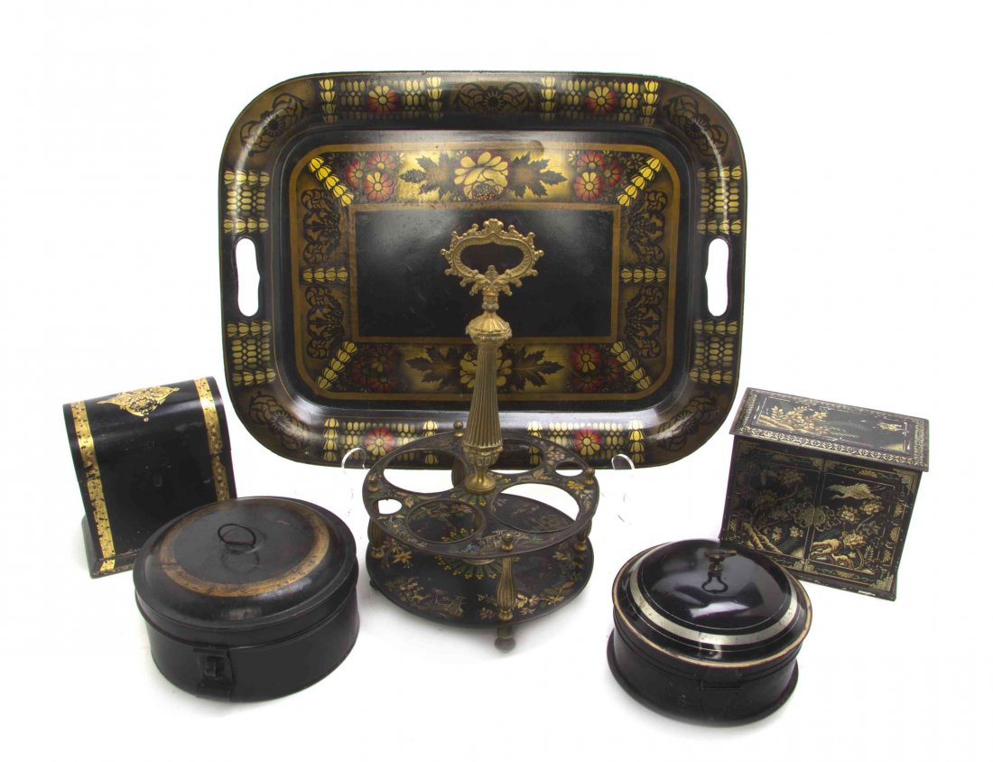 Six Tole and Metal Articles, Width of tray 20 inches.: Six Tole and Metal Articles, comprising a tray, two circular canisters, a tea caddy, a biscuit box and a gilt bronze mounted cruet stand. Width of tray 20 inches.