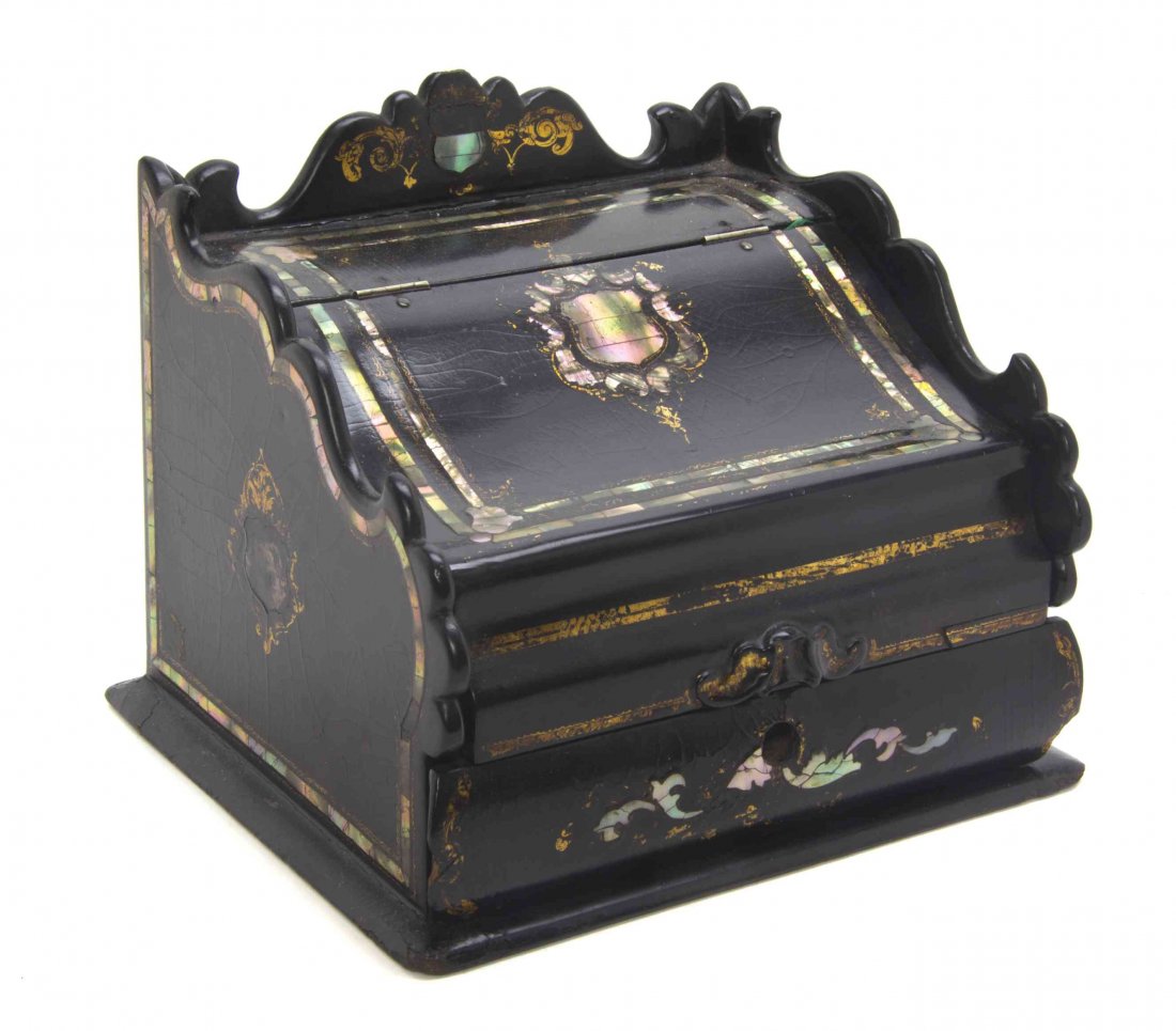 A Victorian Mother-of-Pearl Inlaid Papier Mache Letter: A Victorian Mother-of-Pearl Inlaid Papier Mache Letter Box, with a hinged lid opening to three slots above a drawer with a fitted interior. Height 7 1/2 x width 9 x depth 8 1/4 inches.
