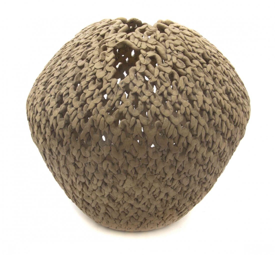 A Studio Pottery Vase, Height 12 inches.: A Studio Pottery Vase, SUE ABBRESCIA, of openwork ovoid form. Height 12 inches. Property from the Estate of Robert P. Stupp, Saint Louis, Missouri