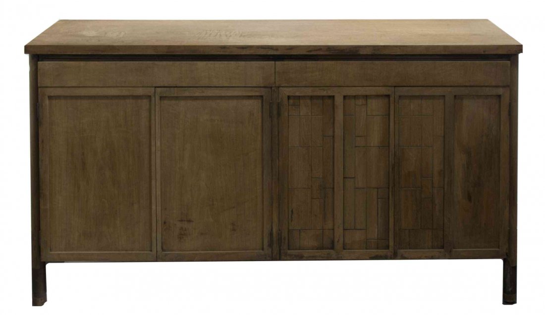 An American Mid-Century Sideboard, Height 33 x width 61: An American Mid-Century Sideboard, JOHNSON FURNITURE CO., having a rectangular top above two drawers and four paneled doors, raised on turned legs. Height 33 x width 61 x depth 20 1/4 inches. Height 3