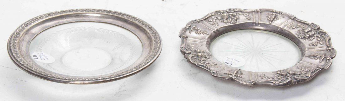 Two Silver Mounted Cut Glass Table Articles Diameter of: Two Silver Mounted Cut Glass Table Articles comprising a wine coaster, Francis I pattern, Reed & Barton, and a saucer, Matthews & Prior Diameter of largest 6 3/4 inches Property of a Lady, St. Augusti