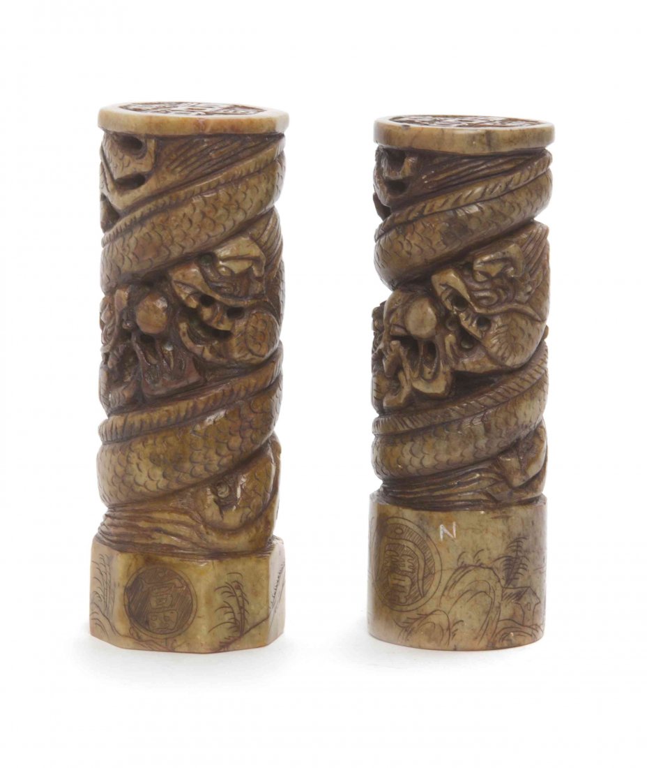 A Pair of Chinese Carved Soapstone Seals, Height 4 5/8: A Pair of Chinese Carved Soapstone Seals, each with dragon decoration. Height 4 5/8 inches.