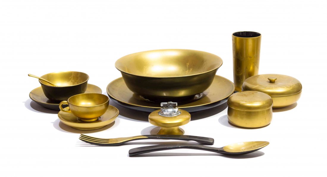 An Assembled Japanese Lacquer Table Service, Diameter: An Assembled Japanese Lacquer Table Service, comprising tumblers, bowls, cups and saucers, demitasse spoons, plates, serving bowl, platter, serving utensils, covered bowls, butter pats and a lighter; 
