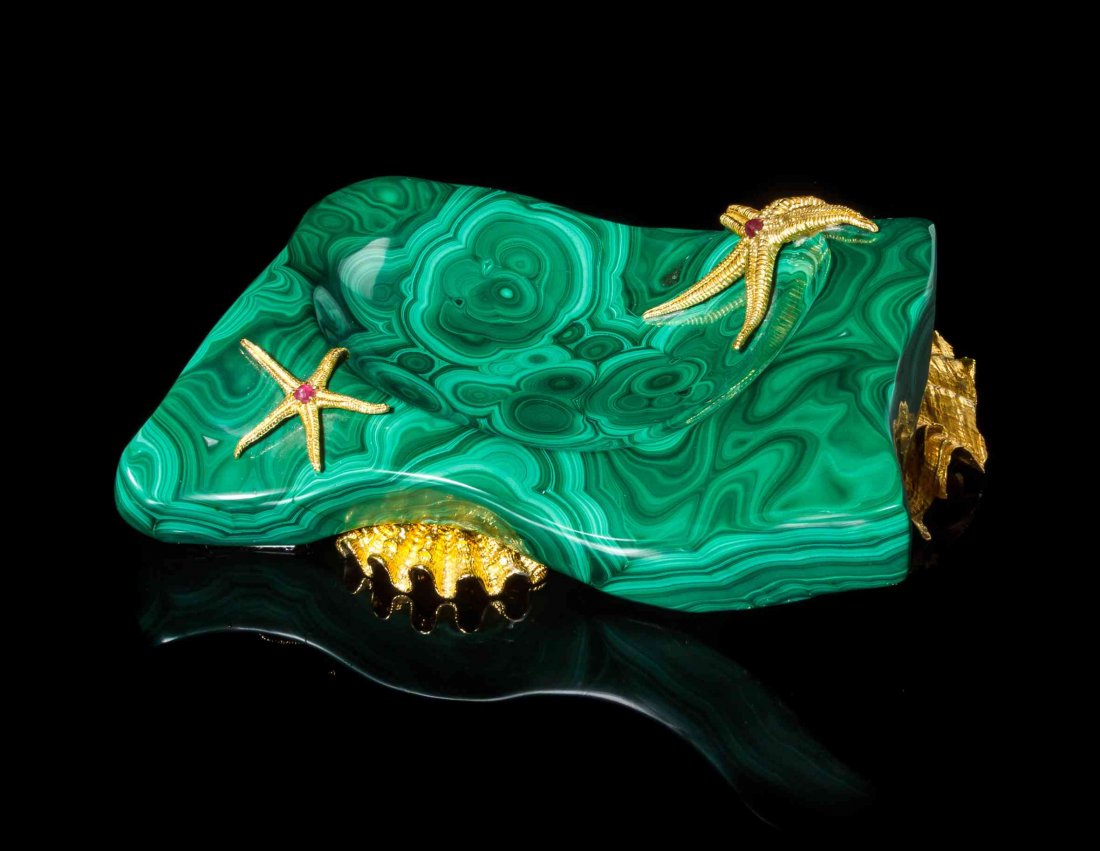 A Malachite, Ruby and Silver Gilt Bonbonni?re, Nardi,,: A Malachite, Ruby and Silver Gilt Bonbonni?re, Nardi, Venice, Italy, in a freeform design, the polished malachite sections showing the elegant banded botryoidal patterns of light to deep green, accent
