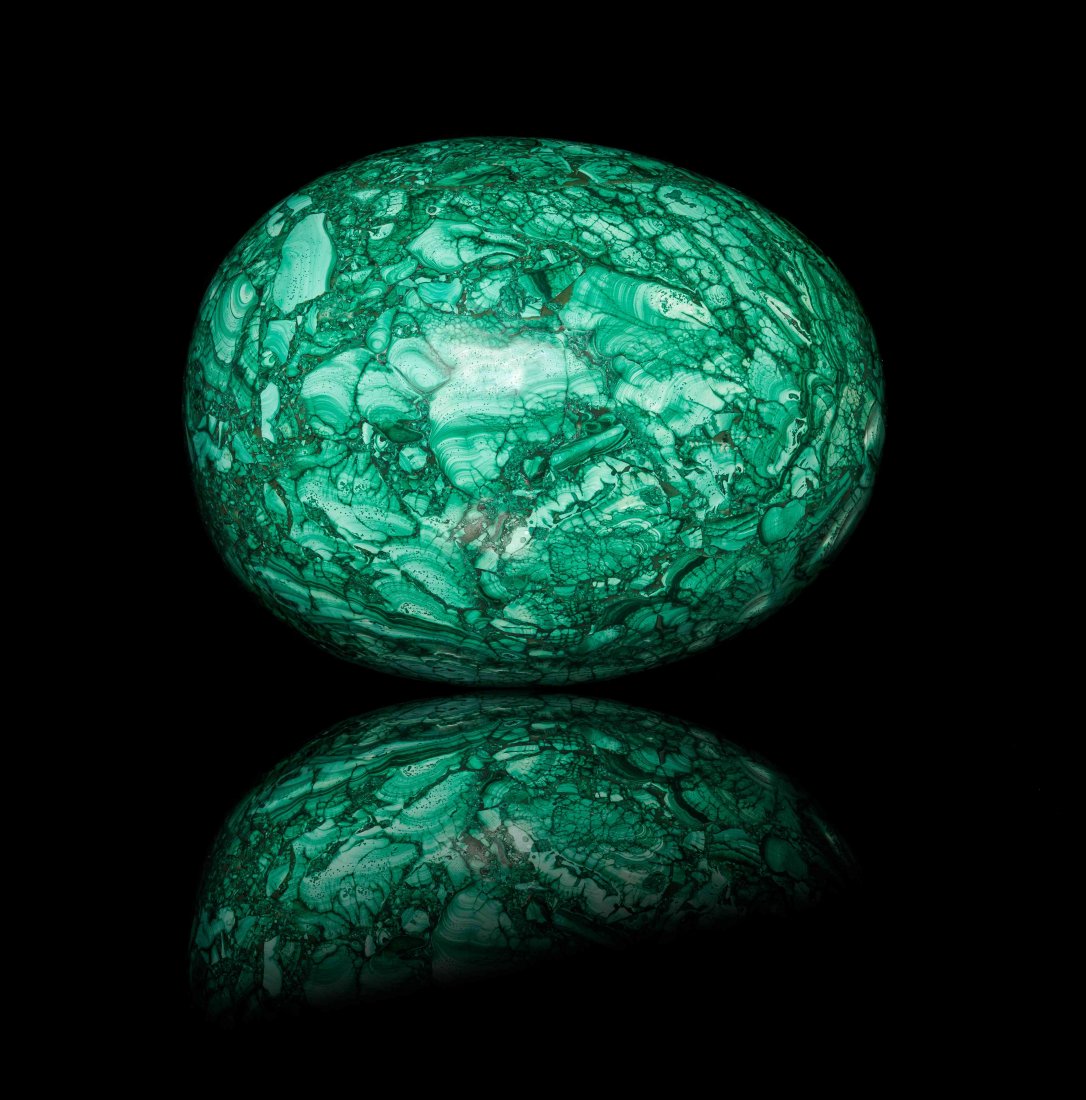 A Malachite Egg,, Democratic Republic of the Congo,,: A Malachite Egg, Democratic Republic of the Congo, finely polished to display the complex botryoidal growth patterns and rich light to deep green colors. Height: 22.90 cm. Property from the Estate of 