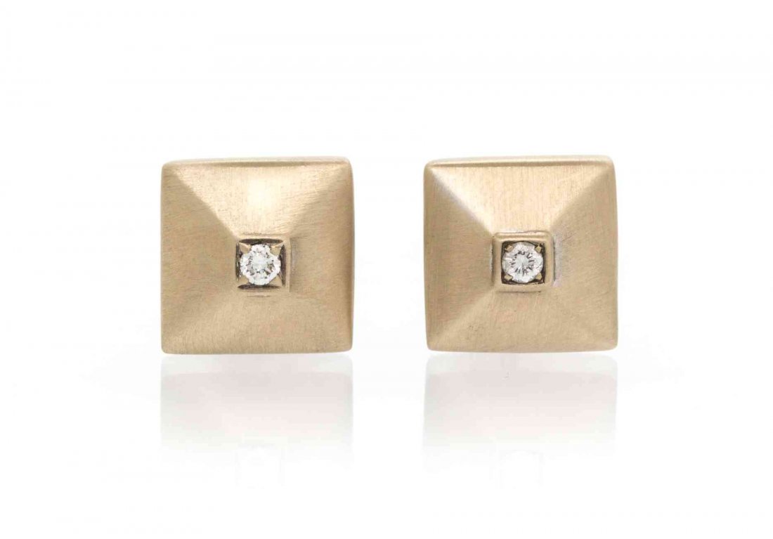 A Pair of 18 Karat White Gold and Diamond Cufflinks,: A Pair of 18 Karat White Gold and Diamond Cufflinks, Chimento, consisting of a shallow pyramid shape with a satin finish and containing two round brilliant cut diamonds weighing approximately 0.10 car