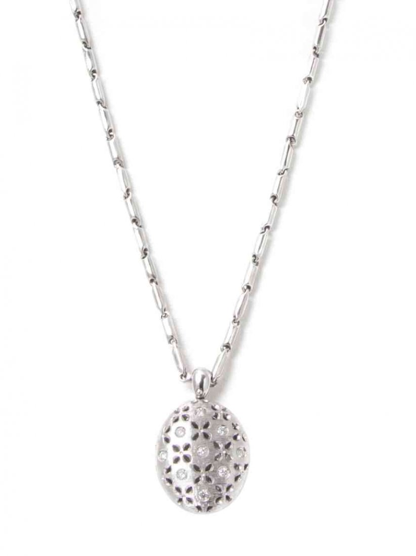 An 18 Karat White Gold, Diamond and Ruby Locket with: An 18 Karat White Gold, Diamond and Ruby Locket with Chain, Roberto Coin, the bar link chain suspending an oval openwork locket containing nine round brilliant cut diamonds weighing approximately 0.18