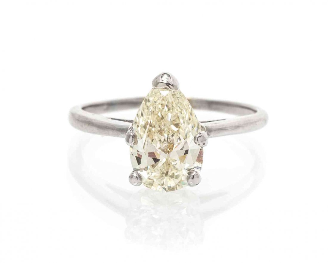 A 14 Karat White Gold and Diamond Solitaire Ring, 1.85: A 14 Karat White Gold and Diamond Solitaire Ring, containing one pear shape diamond weighing approximately 2.20 carats. Accompanied by a Gemological Institute of America diamond grading certificate nu
