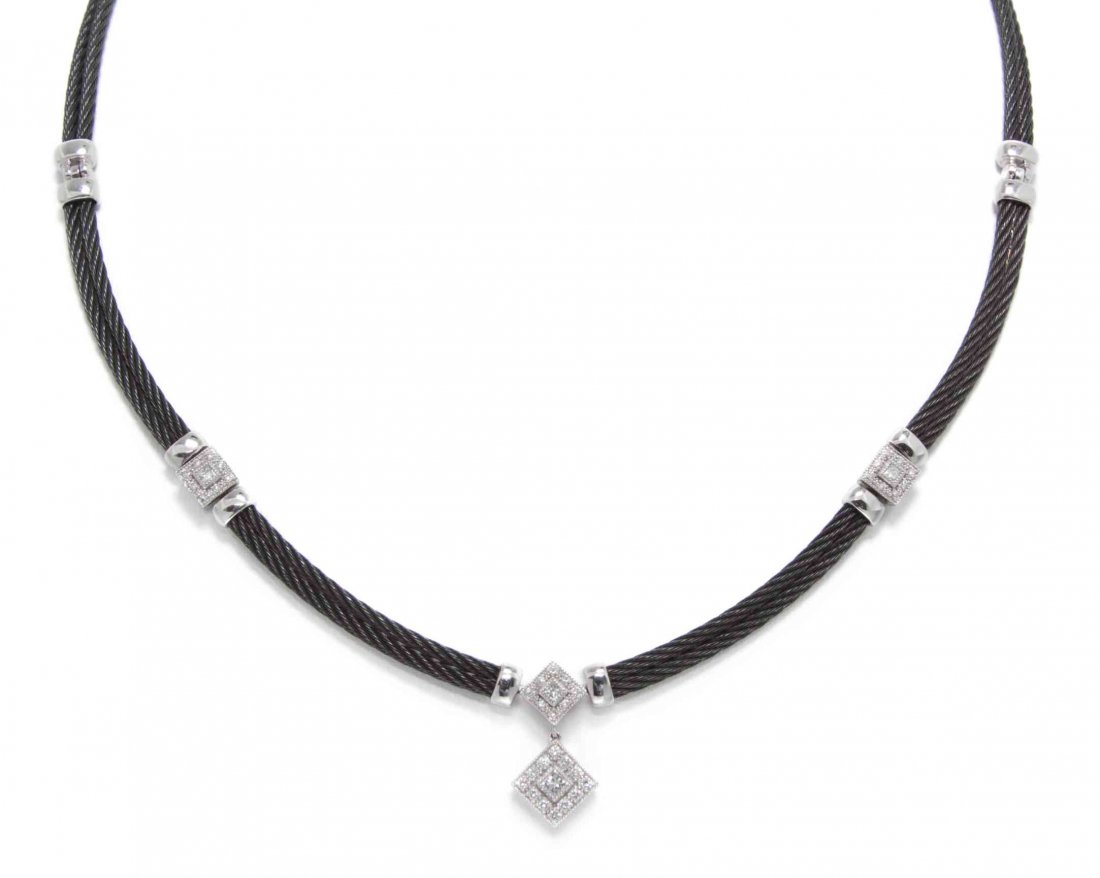 A Black PVD Coated Stainless Steel, 18 Karat White Gold: A Black PVD Coated Stainless Steel, 18 Karat White Gold and Diamond Celtic Noir Necklace, Charriol, consisting of a double row of black PVD coated stainless steel coated wire in eight sections with 18