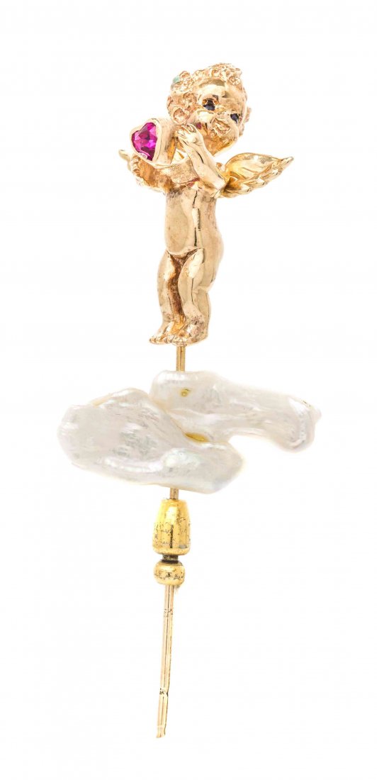 A 14 Karat Yellow Gold, Synthetic Ruby, Sapphire and: A 14 Karat Yellow Gold, Synthetic Ruby, Sapphire and Cultured Pearl Jabot Pin, Ruser, consisting of a sculpted gold cherub accented with two round mixed cut sapphire eyes and holding a heart shape syn