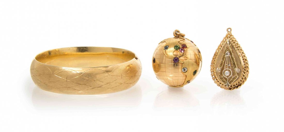 A Collection of Yellow Gold, Diamond and Multi Gem: A Collection of Yellow Gold, Diamond and Multi Gem Jewelry, consisting on a bangle with an engraved textured finish, a globe pendant set with multiple colored gemstones including amethyst, peridot, bl