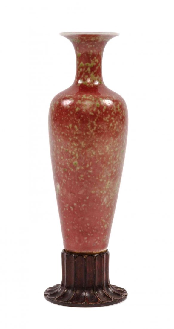 A Peach Bloom Vase, Height 6 inches.: A Peach Bloom Vase, 18th/19th century of slender, amphora form, with six-character Kangxi mark to the underside, raised on a florifom carved hardwood stand. Height 6 inches.