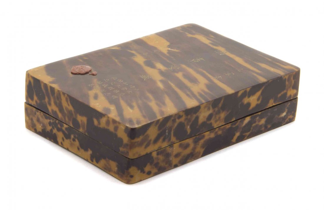 A Tortoiseshell Inkstone Case and Cover with Inkstone,: A Tortoiseshell Inkstone Case and Cover with Inkstone, the case of rectangular form with rounded corners, the cover inscribed Zuo Zong Tang, Hong Shu Tang Cang and with cyclical date mark correspondin