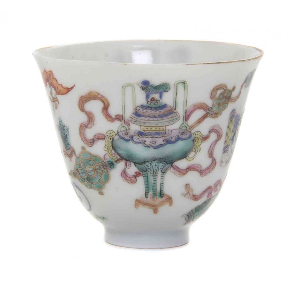 A Polychrome Enamel Porcelain Cup, Height 2 1/8 inches.: A Polychrome Enamel Porcelain Cup, Jiaqing Mark and Likely of the Period (1760-1820) having a slightly flared mouth rim, the exterior depicting traditional vessels, a bat bearing a wan symbol, the und