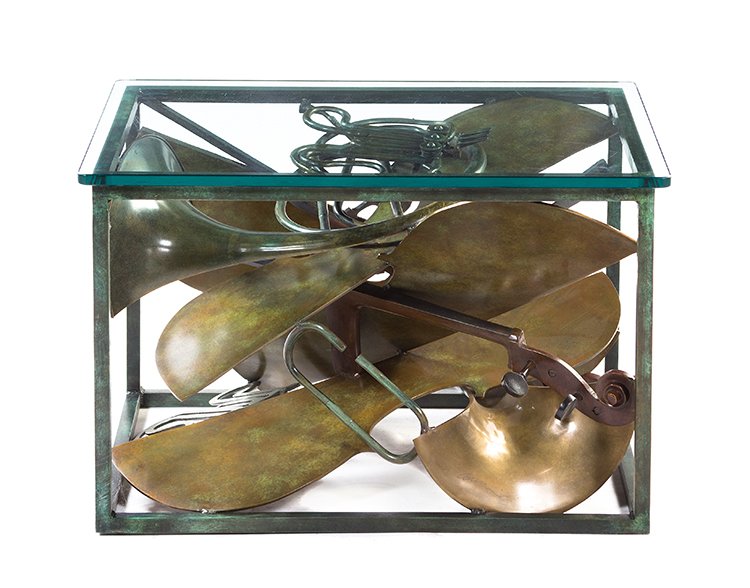 Arman, (American/French, 1928-2005), Musical Instrument: Arman (American/French, 1928-2005) Musical Instrument Table bronze and glass 18 1/2 x 29 x 21 inches. Provenance: Hotel Le Parc, Le Parc Jazz Lounge, Paris, France Condition: Please contact us for a c