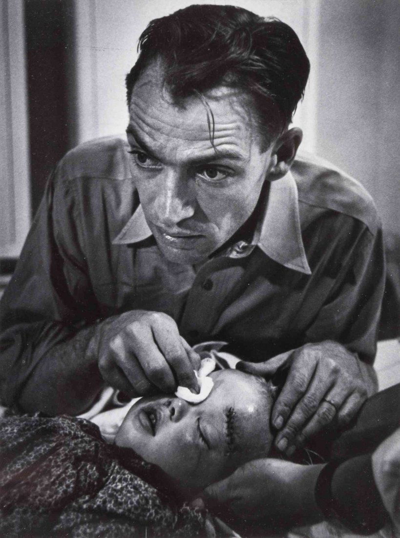 W. Eugene Smith, (American, 1918-1978), Dr. Ernest: W. Eugene Smith (American, 1918-1978) Dr. Ernest Ceriani tending to Lee Marie Wheatly, 1948 (from Country Doctor essay) gelatin silver print signed W. Eugene Smith and titled (verso) 7 1/2 x 5 1/2 inc