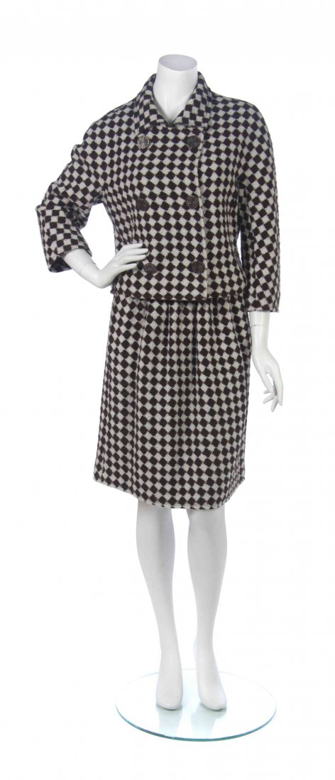 An Oscar de la Renta Brown and White Checkered Suit,: An Oscar de la Renta Brown and White Checkered Suit, comprised of a double breasted jacket, together with an A-line skirt. Labeled: Oscar de la Renta. Property donated by Patrons and friends of the De