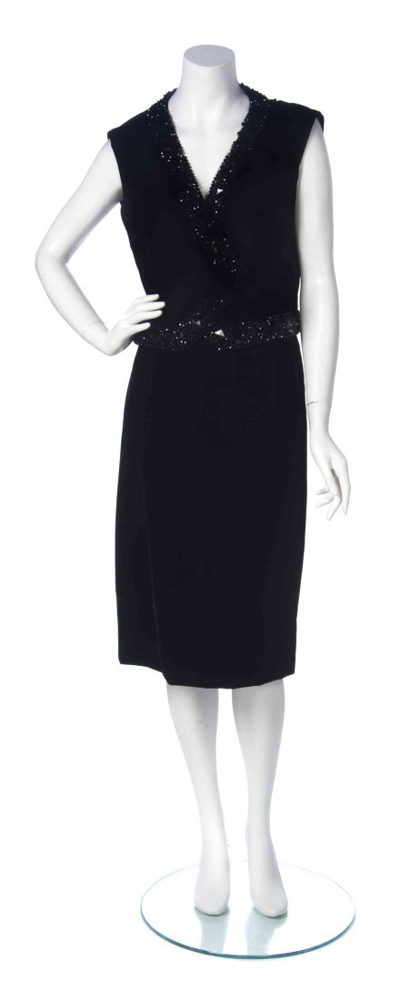 A Marc Bohan for Christian Dior Black Velvet Dress: A Marc Bohan for Christian Dior Black Velvet Dress Ensemble, circa 1960, comprised of a sleeveless V-neck dress with a silk bodice, and a velvet bottom, together with a velvet vest with a single snap 