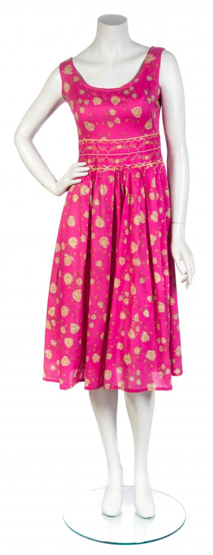 An Emilio Pucci Pink Cotton Print Dress,: An Emilio Pucci Pink Cotton Print Dress, sleeveless with a wide neckline, fitted waist and a soft pleated skirt. Labeled: Emilio Pucci.