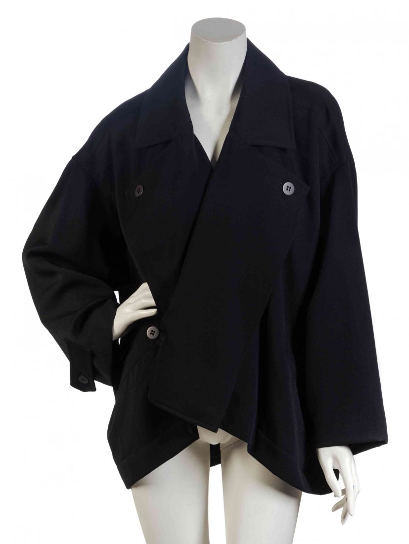An Issey Miyake Plantation Coat, Size M.: An Issey Miyake Plantation Coat, open front, with a folded front detail, large button down lapel, and diagonal slip pockets to the hips. Labeled: Plantation. Size M.