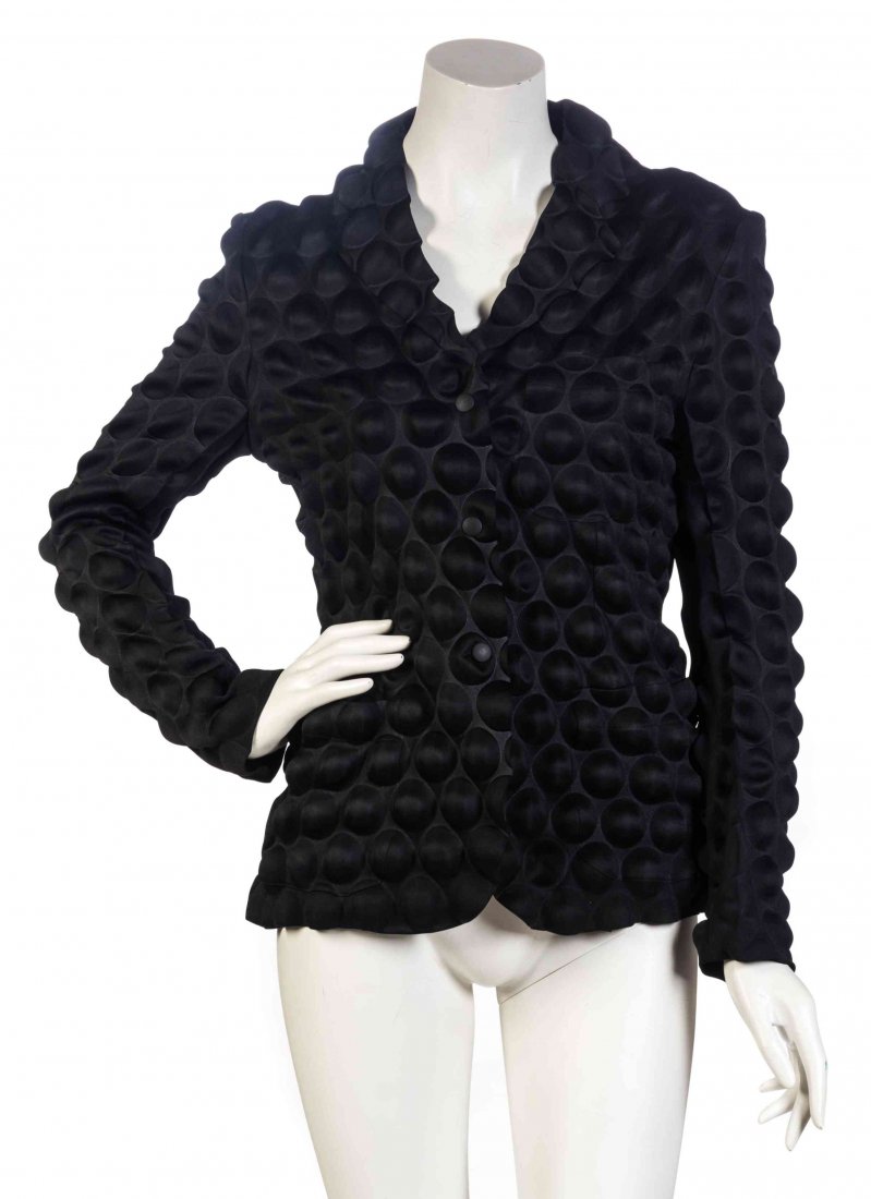 An Issey Miyake Black Egg Crate Embossed Jacket, Size: An Issey Miyake Black Egg Crate Embossed Jacket, center front snap buttons, and three patch pockets. Labeled: Issey Miyake. Size 3. Condition: Overall very good condition. Please note the following: M