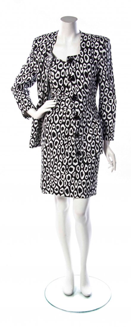 A Patrick Kelly Black and White Animal Print Three: A Patrick Kelly Black and White Animal Print Three Piece Ensemble, comprised of a button down fitted jacket with a square neckline, a strapless top with a sweetheart neckline and tie back, together wi
