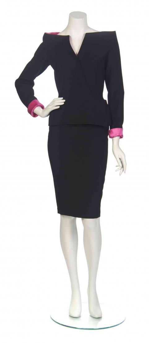A Thierry Mugler Black and Pink 'High Style' Wool: A Thierry Mugler Black and Pink 'High Style' Wool Cocktail Ensemble, comprised of a structured, off-the shoulder jacket with pink satin lining and cuffs, together with a fitted black pencil skirt. Lab