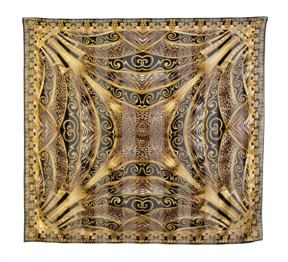 A Group of Four Designer Scarves,: A Group of Four Designer Scarves, comprised of a Balenciaga multicolor silk scarf, a Christian Dior blue and green silk scarf, a Christian Dior navy wool and silk scarf, and a Lanvin silk scarf in an 