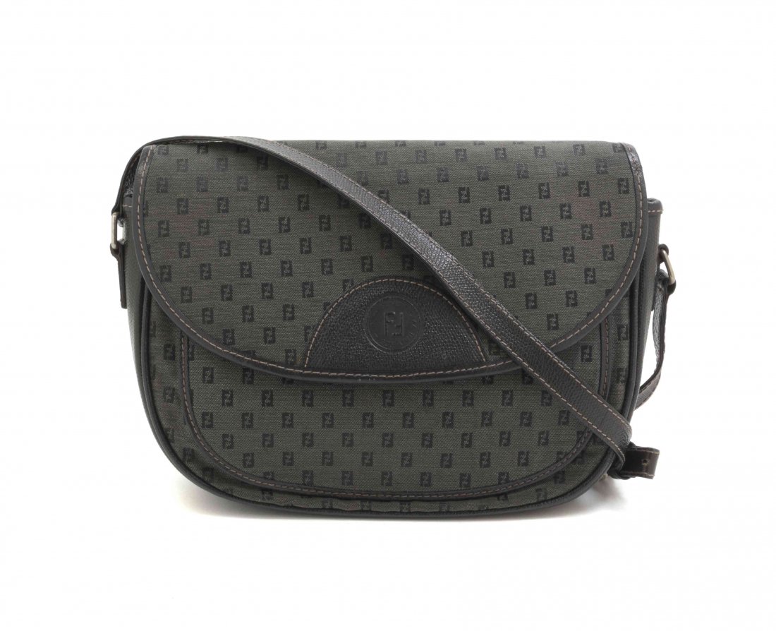 A Fendi Black Monogram Canvas Bag, 8 1/2 x 7 1/4 x 2: A Fendi Black Monogram Canvas Bag, adjustable leather strap, with leather trim, foldover flap, and an interior zippered pocket. Stamped: Fendi. 8 1/2 x 7 1/4 x 2 inches. Condition: Overall very good c