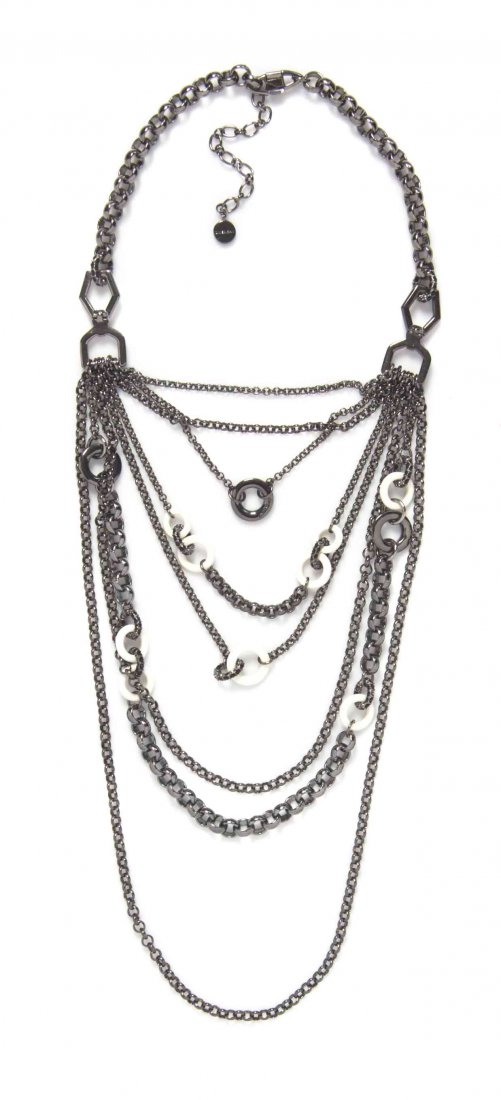 A Givenchy Pewter Multichain Necklace,: A Givenchy Pewter Multichain Necklace, graduating chainlink strands, with circular ivory and black rhinestone beads. Stamped: Givenchy. Condition: Overall excellent condition.