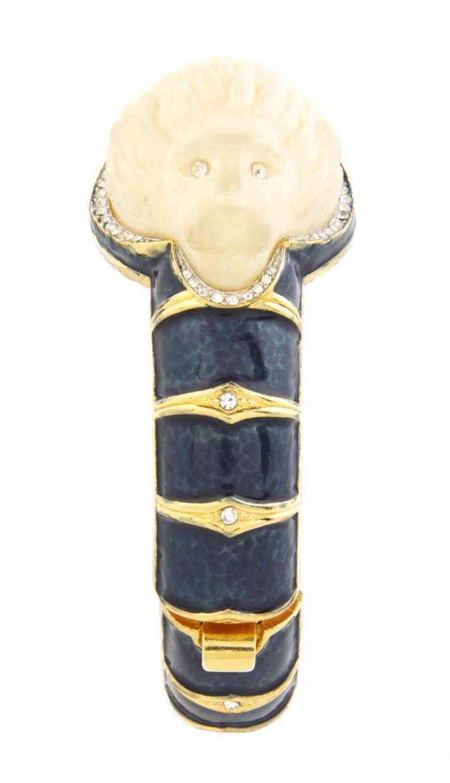 A Hattie Carnegie Carved Lion's Head Bracelet,: A Hattie Carnegie Carved Lion's Head Bracelet, with all-over marine enamel and rhinestone detailing. Stamped: Hattie Carnegie. Property from a Private Collection Condition: Overall very good condition