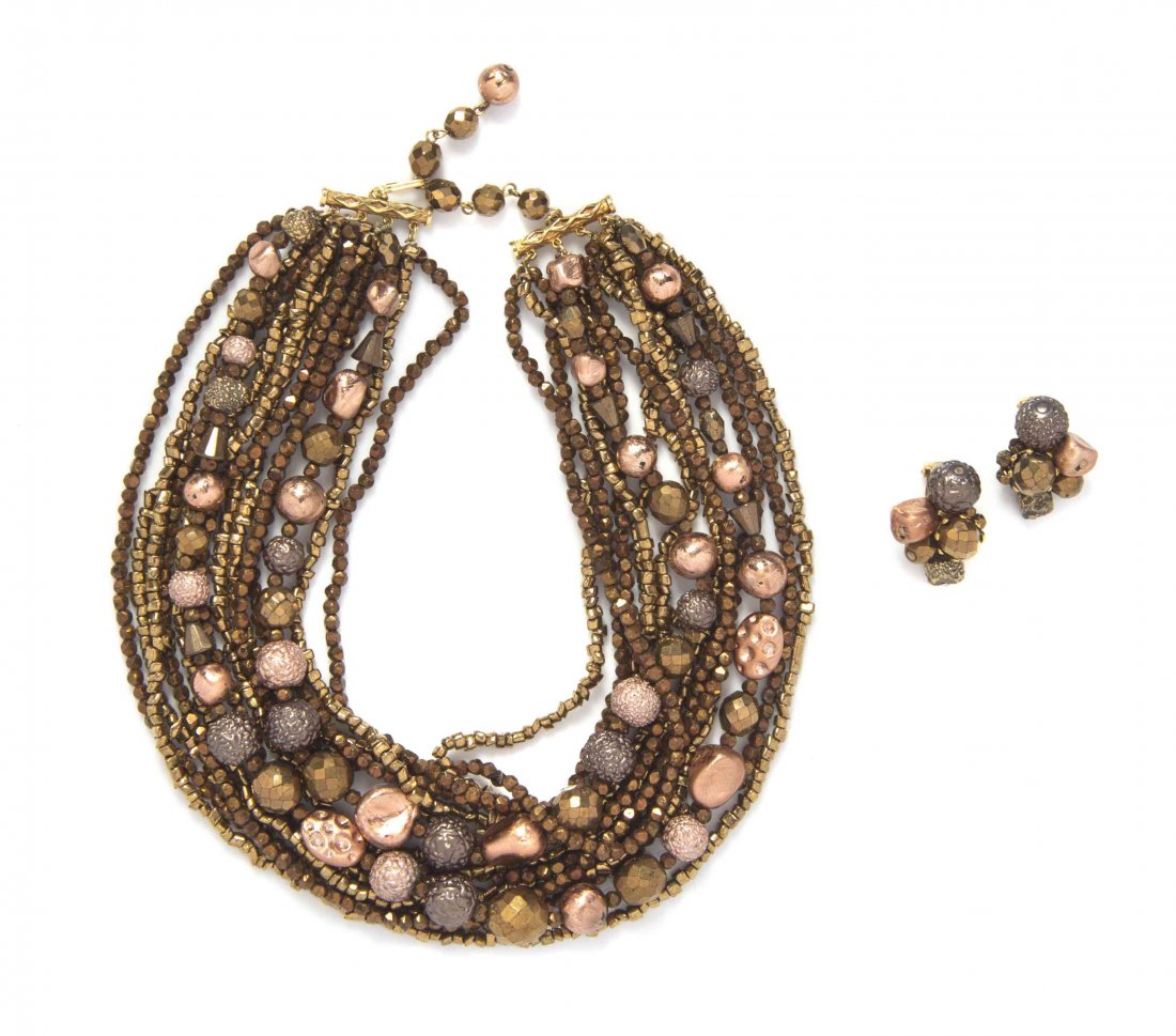 A Hattie Carnegie Bronze Beaded Demi-Parure,: A Hattie Carnegie Bronze Beaded Demi-Parure, comprised of a multistrand necklace with varying shaped beads, together with matching earclips. Stamped: Carnegie. Property from a Private Collection Condi
