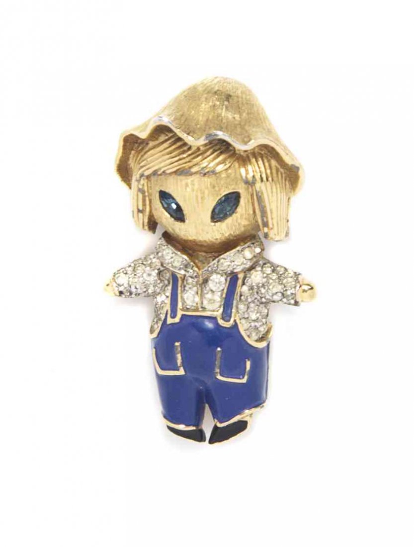 A Jomaz Doll Brooch,: A Jomaz Doll Brooch, with pave rhinestones, and faux sapphires. Stamped: Jomaz. Property from a Private Collection Condition: Overall very good condition. Please note the following: Clasp feels tighte