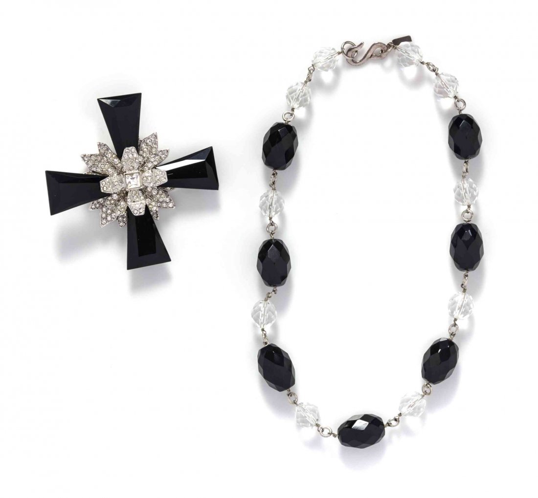 A Kenneth Jay Lane Choker Necklace and Convertible: A Kenneth Jay Lane Choker Necklace and Convertible Brooch, with faceted clear and faux jet beads, and a faux jet convertible pendant, with a pave rhinestone center. Stamped: Kenneth Lane. Condition: O