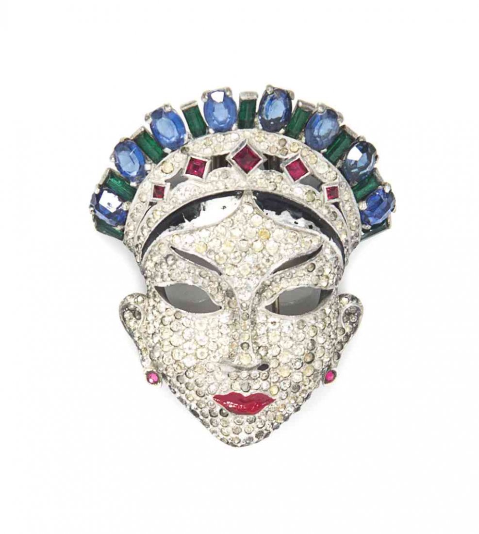 A Rhinestone Mask Fur Clip,: A Rhinestone Mask Fur Clip, pave rhinestones, with faux sapphires, rubies, and emeralds throughout. Attributed to Mazar. Property from a Private Collection Condition: Overall fair condition. Please no