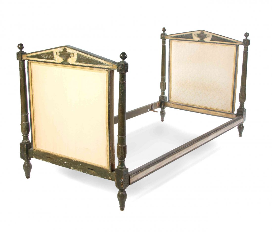 A Louis XVI Cream and Green Painted Bed, 18TH CENTURY,: A Louis XVI Cream and Green Painted Bed, 18TH CENTURY, the headboard and footboard each having a peaked crest centered by an urn above upholstered panels flanked by turned tapering stiles. Height 43 1